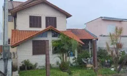 Casa com 3 quartos à venda na Rua dos Guenoas, 72, Guarujá, Porto Alegre