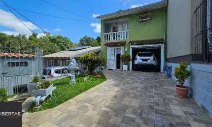 Casa com 3 quartos à venda na Acesso Nelson Silva, 107, Vila Nova, Porto Alegre
