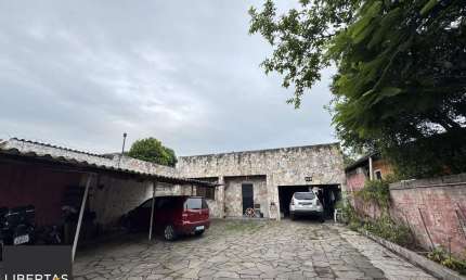 Casa com 6 quartos à venda na Rua Upamaroti, 578, Cristal, Porto Alegre