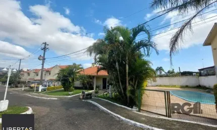 Casa em condomínio fechado com 2 quartos à venda na Avenida Edgar Pires de Castro, 350, Hípica, Porto Alegre