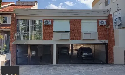 Apartamento térreo com 3 dormitórios e 2 vagas no Bairro Cristo Redentor