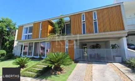 Casa Condominio em Porto Alegre, no bairro Hípica, com 3 dormitório(s), e 3 banheiros, à venda.