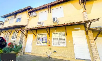 Casa de dois quartos, uma vaga de garagem, em condomínio fechado em Porto Alegre