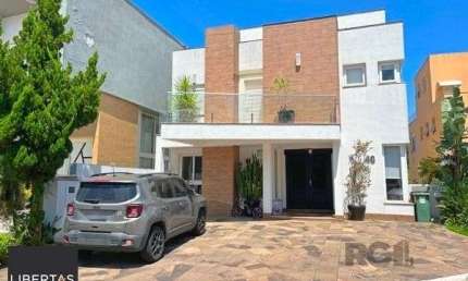 Casa em Porto Alegre, no bairro Aberta dos Morros, com 3 dormitório(s), e 3 banheiros, à venda.