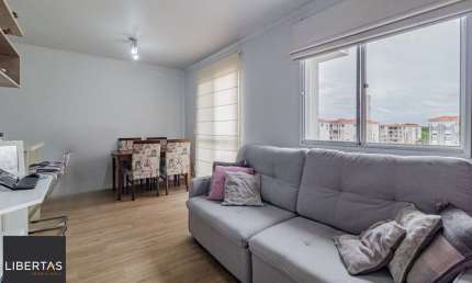 Apartamento com 2 dormitórios e 1 vaga de garagem escriturada no Bairro Humaitá