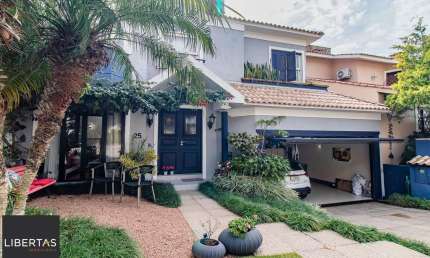 CASA DE 4 DORMITÓRIOS EM CONDOMÍNIO - 320 m² - 4 VAGAS DE GARAGEM