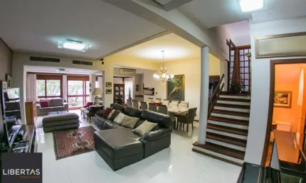 Casa em condomínio fechado com 6 quartos à venda na Rua Gustavo Schmidt, 377, Três Figueiras, Porto Alegre