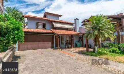 Casa com 4 quartos à venda na Rua Manoel Cabeda Perez, 63, Jardim Isabel, Porto Alegre