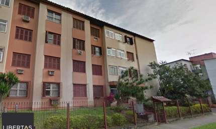 Apartamento com 02 quartos e 01 vaga escriturada no Bairro Rubem Berta