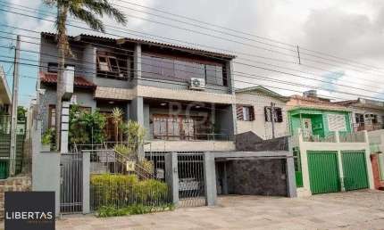 Casa com 5 dormitórios, 550 m² - para Comprar  -Vila Jardim - Porto Alegre/RS
