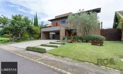 Casa em condomínio fechado com 4 quartos à venda na Avenida Juca Batista, 8000, Belém Novo, Porto Alegre