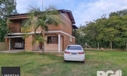 Casa com 2 quartos à venda na Beco da Vitória, 273, Boa Vista do Sul, Porto Alegre
