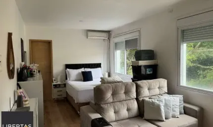 Apartamento JK com garagem escriturada no bairro Tristeza em Porto Alegre