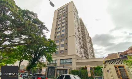 APARTAMENTO SEMIMOBILIADO 2 DORMITÓRIOS SENDO 1 SUÍTE E 1 VAGA ESCRITURADA