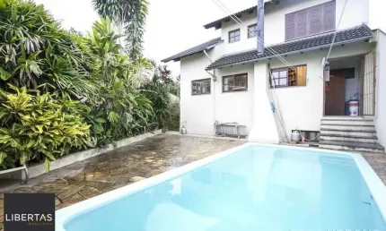 Casa 3 dormitórios à venda no Bairro Parque Santa Fé - Porto Alegre