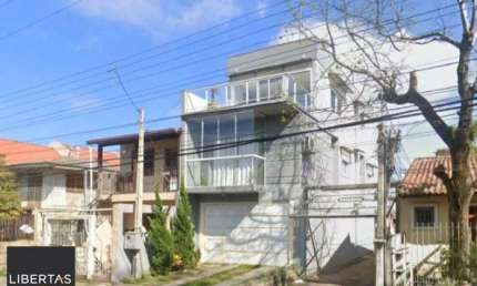 Sobrado de Alto Padrão na Vila Nova – 3 Dormitórios e 170 m² de Conforto e Estilo!
