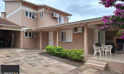 Casa com 3 quartos à venda na Rua César de Castro, 163, Teresópolis, Porto Alegre