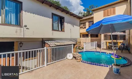Casa 4 dormitórios à venda no Bairro Nonoai - Porto Alegre