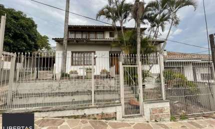 Casa com 6 quartos à venda na Rua João Bonuma, 120, Partenon, Porto Alegre