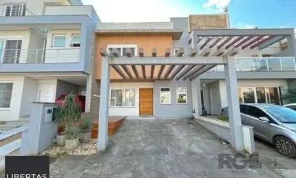 Casa em Porto Alegre, no bairro Hípica, com 3 dormitório(s), e 3 banheiros, à venda.