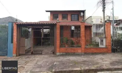 Venda de Casa 3 Dormitórios com Suíte e Churrasqueira no Partenon
