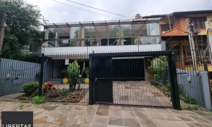 Casa com 3 quartos à venda na Rua Canto e Melo, 34, Nonoai, Porto Alegre