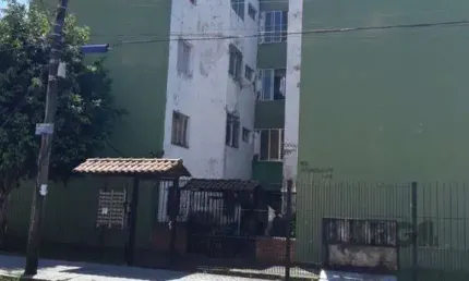 Apartamento térreo de dois dormitórios no bairro Santa Rosa de Lima em Porto Alegre.