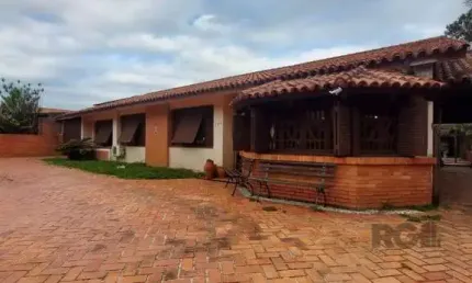 Casa com 5 quartos à venda na Rua Cariri, 174, Vila Assunção, Porto Alegre