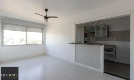 Apartamento semimobiliado à venda no bairro cristal, 2 dormitórios, 2 banheiros, 1 vaga coberta e vista livre para o guaíba