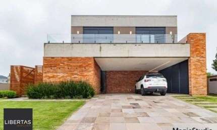 Casa em Condomínio à venda com 4 dormitórios, 488m² e 4 vagas no bairro Alphaville, Zona Sul de Porto Alegre