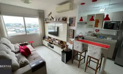 Apartamento de 2 Dormitórios, suíte, churrasqueira e 2 vagas.