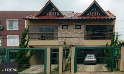 Casa com 3 quartos à venda na Rua Dom Jaime de Barros Câmara, 705, Sarandi, Porto Alegre