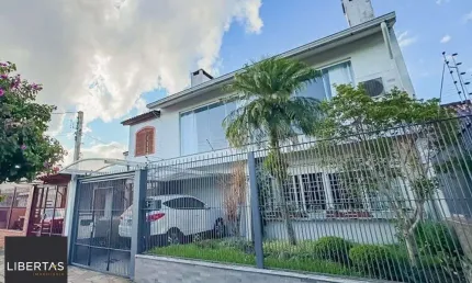 Casa com 4 quartos à venda na Rua Pedro Waine, 194, Santa Maria Goretti, Porto Alegre