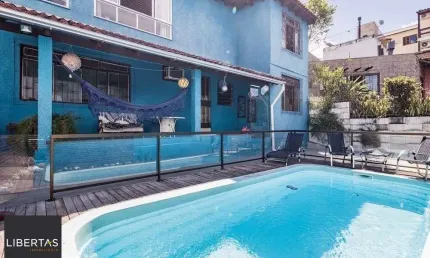 Casa com 4 quartos à venda na Eleuthério De Araújo, 88, Partenon, Porto Alegre