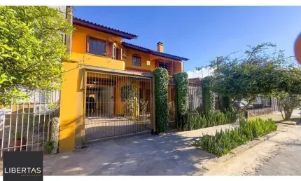 Casa com 4 quartos à venda na Rua Coronel Jaime da Costa Pereira, 340, Partenon, Porto Alegre