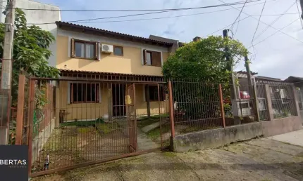 Casa com 4 quartos à venda na Rua Doutor Cláudio Walter Ferreira da Silva, 191, Guarujá, Porto Alegre
