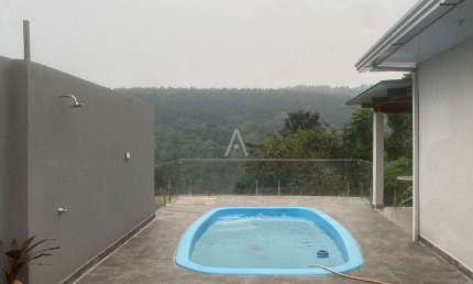 Casa Residencial de VERANEIO com 3 suítes à venda no Bairro Centro, em NOVA PRATA DO IGUAÇU por R$ 670.000,00