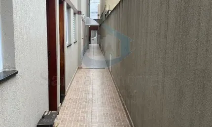 Sobrado em condomínio próximo ao terminal rodoviário da Vila Mirim, 02 dormitórios, 01 vaga.