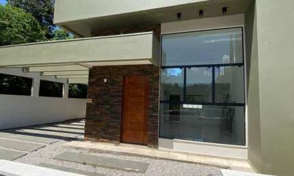Casa com 3 quartos à venda na Rua João Carlos de Araújo e Silva, 221, Forquilhas, São José por R$ 695.000