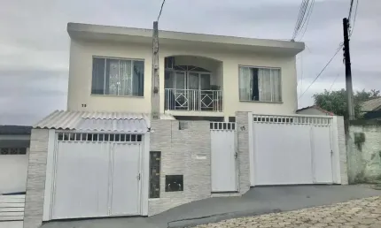 Casa com 3 quartos à venda na Albino Rocha, 7766, Bela Vista, São José por R$ 850.000