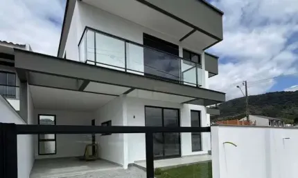 Casa com 3 quartos à venda na Travessa Judith Maria Maciel, 922, Forquilhas, São José por R$ 780.000