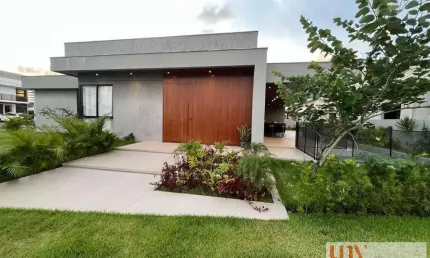Casa luxuosa com 4 suítes e área de lazer privativa em condomínio fechado no bairro de Intermares