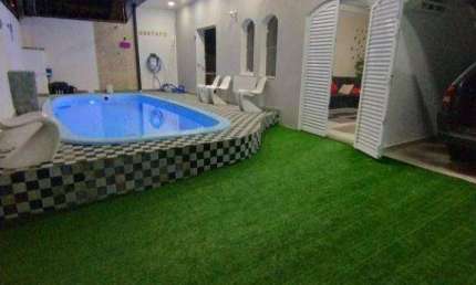 Casa com 4 dormitórios à venda, 140 m² por R$ 795.000,00 - Balneário Guarujá - Guarujá/SP