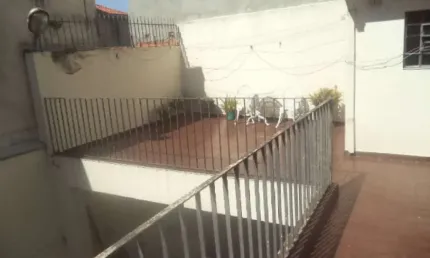 Terreno com 10 metros de frente  com área construida (duas casas boas)