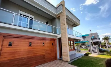 Casa com 3 quartos à venda no Centro, Imbé  por R$ 980.000