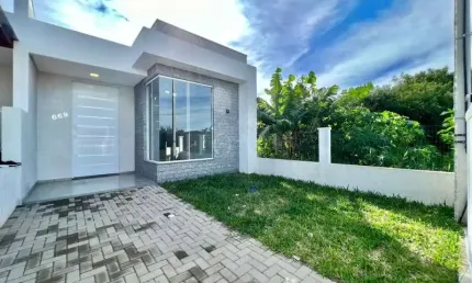 CASA COM 2 DORMITORIOS, SENDO 1 SUITE BEM LOCALIZADO!