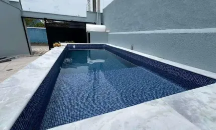 Casa com piscina, 3 quartos e área gourmet em Itanhaém.