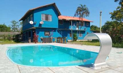 Chácara com 5 quartos, piscina e área gourmet em Itanhaém.