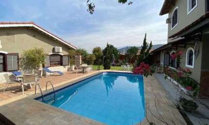 Casa na praia à venda em Itanhaém - R$ 1.000.000,00.