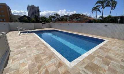 Apartamento na praia com 3 quartos e piscina em Peruíbe.